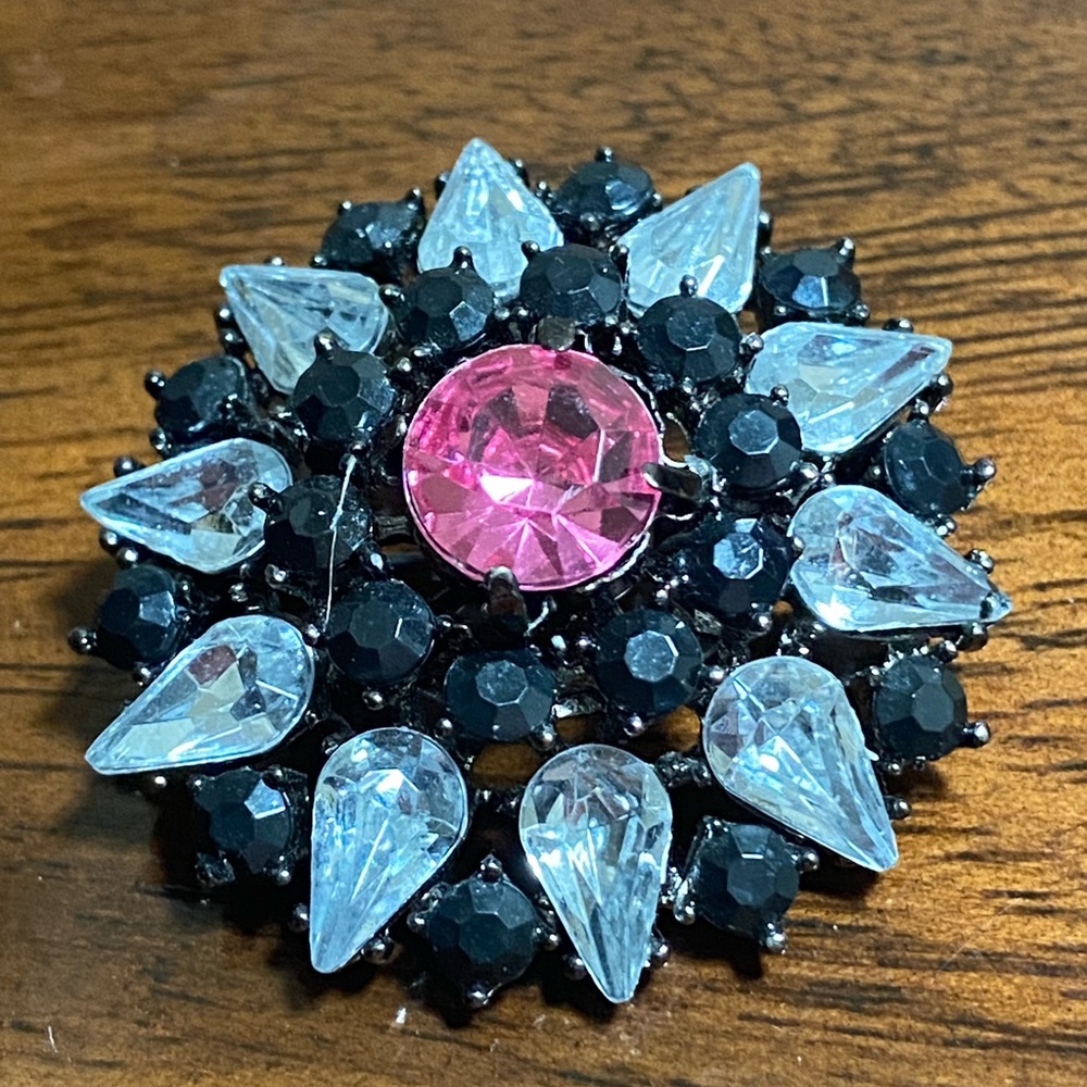 Pink and black rhinestone brooch with clear teardrop stones, high relief, prong
